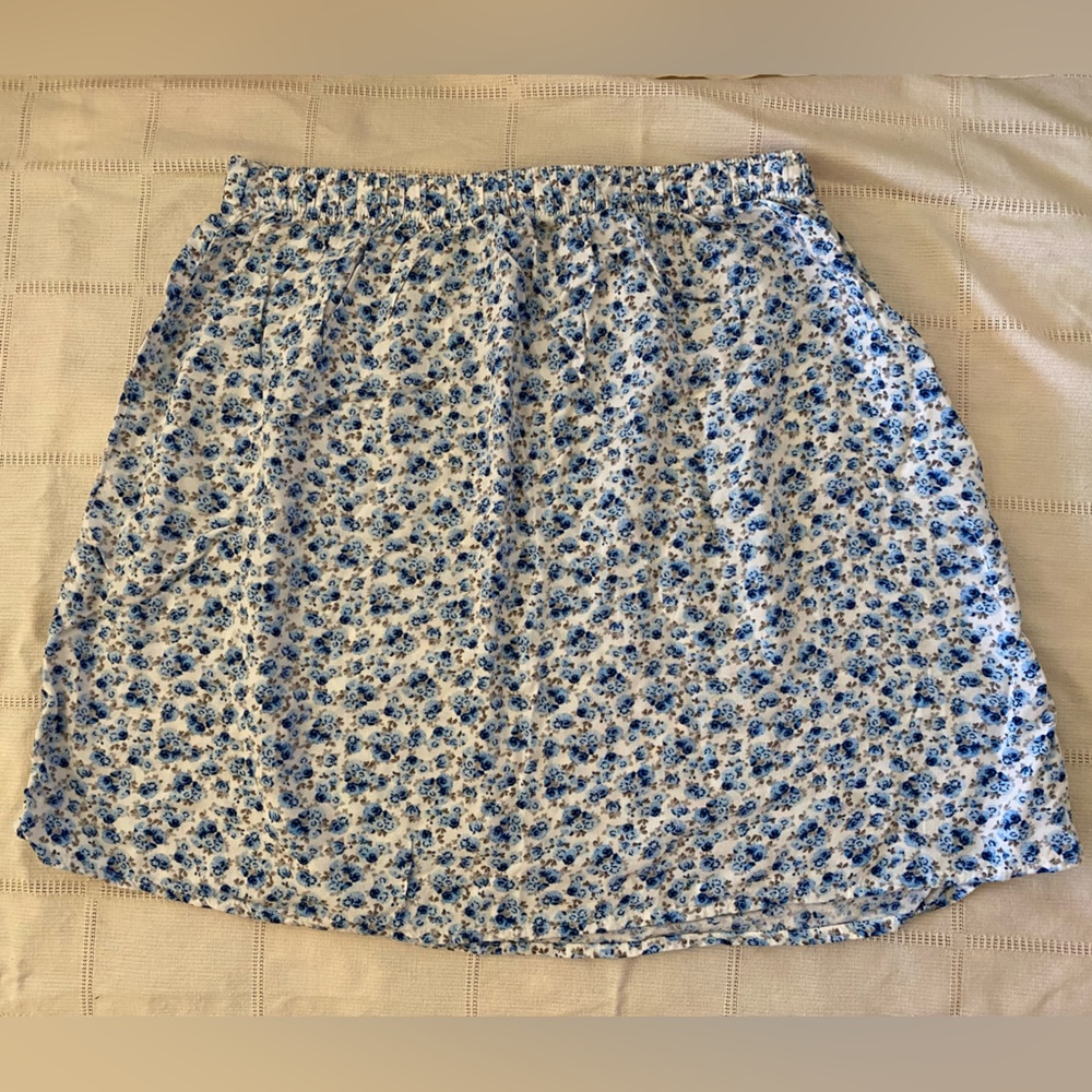 White H&M skirt with blue flowers